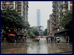 Street scene of Tianhe district on a rainy day, towards CITIC Plaza.